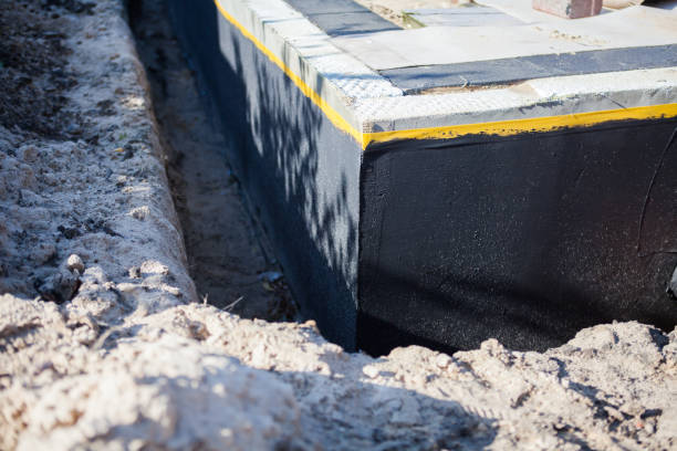 Professional Emergency Waterproofing technician working in Riverdale, NJ